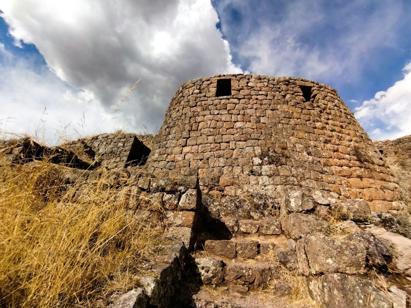 a stone building with windows